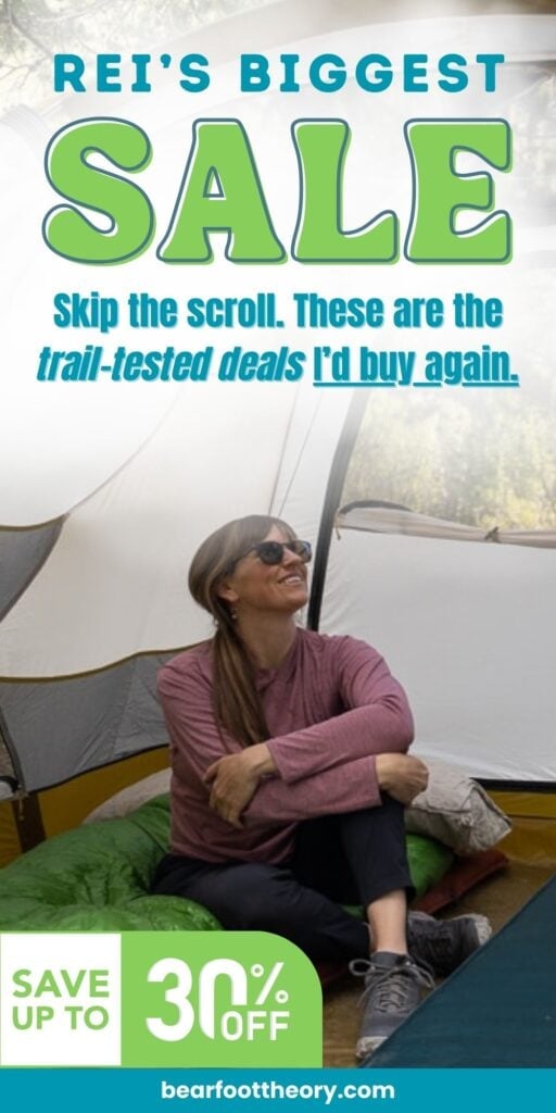 Founder of Bearfoot Theory, Kristen Bor, standing in the door of a sprinter van with the text, "I've lived on the road for 8 years! These are the van life must-haves you should grab in REI's anniversary sale"